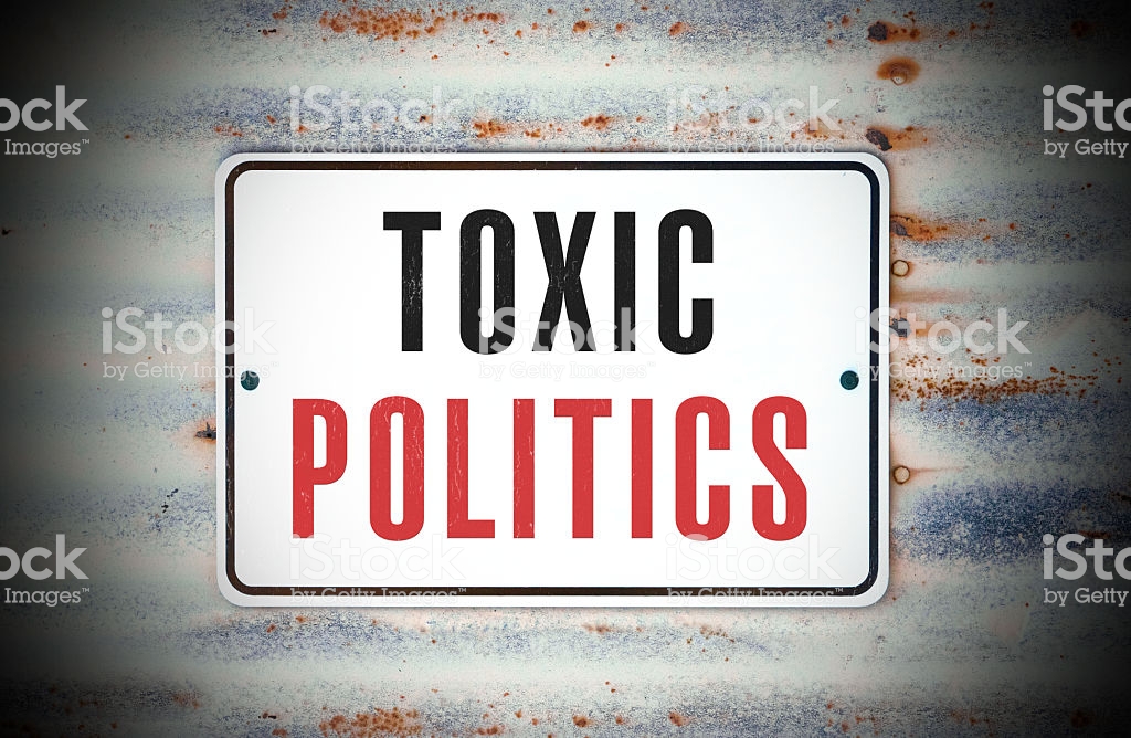 A sign that says "Toxic Politics."